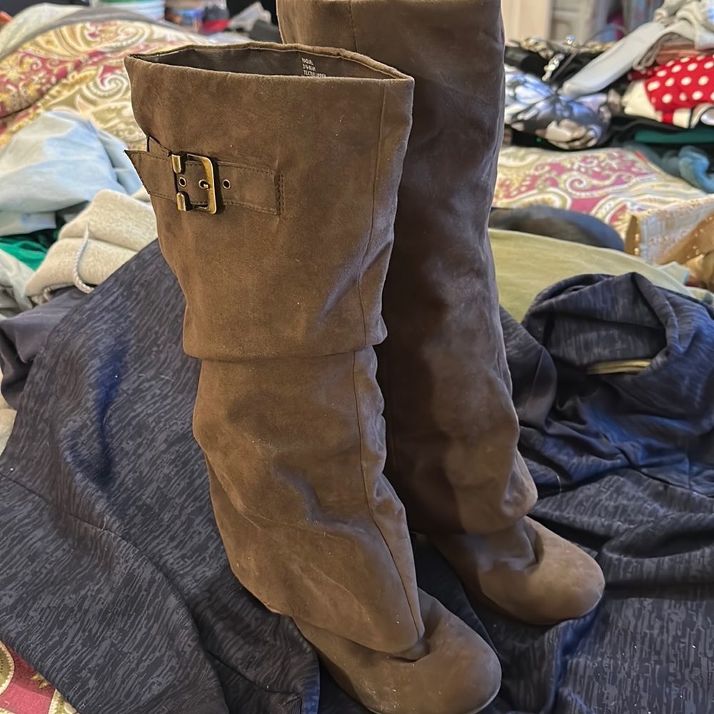 Mid high suede boots.